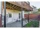 Ground level patio with door, window, and mechanicals visible at 113 Brianna Way, Woodstock, GA 30188