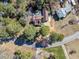 Panoramic aerial view of home nestled among lush greenery at 150 Forest Ridge Ct, Lawrenceville, GA 30046