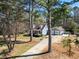 Charming one-story home with an inviting front porch and detached two-car garage at 150 Forest Ridge Ct, Lawrenceville, GA 30046