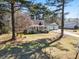 Beautiful single-Gathering home featuring a welcoming front porch and attached two-car garage at 150 Forest Ridge Ct, Lawrenceville, GA 30046