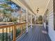 The spacious covered porch offers a pleasant spot for relaxation at 150 Forest Ridge Ct, Lawrenceville, GA 30046