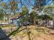 View of the side yard and back of the home at 150 Forest Ridge Ct, Lawrenceville, GA 30046