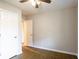 Bedroom showcasing hardwood floors and closet at 391 Oak Dr, Social Circle, GA 30025