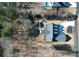 Stunning aerial view of the home with a private pool, landscaped yard, and long driveway at 105 Crown Ln, Woodstock, GA 30188