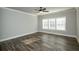 Spacious bedroom with ample natural light, offering a serene retreat for rest and relaxation at 105 Crown Ln, Woodstock, GA 30188