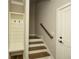Entryway with staircase, coat rack, and access to outside at 105 Crown Ln, Woodstock, GA 30188