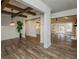 Bright and airy living space with wood floors, coffered ceilings, and views to other rooms at 105 Crown Ln, Woodstock, GA 30188
