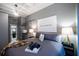 Comfortable bedroom with a cozy bed, closet space, and modern decor at 32 Peachtree Nw St # 1105, Atlanta, GA 30303