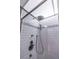 Close-up of the shower with sleek fixtures and white tiled walls at 32 Peachtree Nw St # 1105, Atlanta, GA 30303