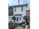 Charming backyard with a screened porch, patio, and lush greenery at 6700 Roswell Rd # 24E, Atlanta, GA 30328