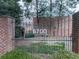 Gated entrance with the house number displayed at 6700 Roswell Rd # 24E, Atlanta, GA 30328