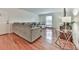 Inviting living room with hardwood floors and large sectional, perfect for relaxing and entertaining guests at 6700 Roswell Rd # 24E, Atlanta, GA 30328