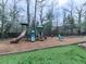 Community playground with slides, swings, and climbing structures at 6700 Roswell Rd # 24E, Atlanta, GA 30328