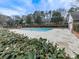 Community pool with a view of the surrounding residential buildings at 6700 Roswell Rd # 24E, Atlanta, GA 30328