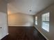 A bright bedroom with vaulted ceilings and large windows at 885 Hemingway Rd, Stone Mountain, GA 30088