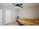 Comfortable bedroom featuring a ceiling fan and ample closet space at 4289 Post Rd, Winston, GA 30187