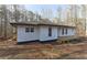 Charming single-story home with a new deck and freshly painted exterior at 4289 Post Rd, Winston, GA 30187