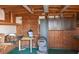 Inside storage building featuring wooden interiors, cabinets and shelving for ample storage at 4289 Post Rd, Winston, GA 30187