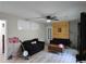 Cozy living room featuring hardwood floors, a ceiling fan, and ample space at 4289 Post Rd, Winston, GA 30187