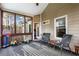 Cozy screened porch perfect for relaxing with views of the backyard at 635 Piping Rock Pt, Lawrenceville, GA 30043