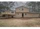 Backyard featuring a deck and lush landscaping that provides a serene outdoor living space at 1106 Oak Sw Rd, Lilburn, GA 30047