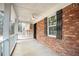 Front porch with an open view of the front yard at 1106 Oak Sw Rd, Lilburn, GA 30047