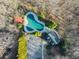 Aerial view of a community pool with picnic area surrounded by trees at 1211 Comet View Se Trl, Smyrna, GA 30082