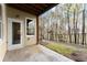 Back patio with a view of the wooded area at 1211 Comet View Se Trl, Smyrna, GA 30082