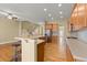 Modern kitchen with an island, stainless appliances, hardwood floors and barstool seating at 1211 Comet View Se Trl, Smyrna, GA 30082