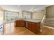 Open-concept kitchen with stainless steel appliances, granite countertops, and bar seating at 1211 Comet View Se Trl, Smyrna, GA 30082