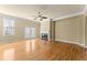 Spacious living room featuring a fireplace, hardwood floors, and ample natural light at 1211 Comet View Se Trl, Smyrna, GA 30082