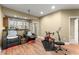 Cozy living room featuring a large window, hardwood floors, and comfortable seating at 1211 Comet View Se Trl, Smyrna, GA 30082