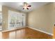Bright living room with hardwood floors and sliding glass doors to outdoor space at 1211 Comet View Se Trl, Smyrna, GA 30082