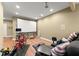 Relaxing living room with mounted projector screen and comfortable furniture at 1211 Comet View Se Trl, Smyrna, GA 30082