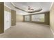 Expansive main bedroom featuring tray ceiling, carpeting and large windows at 1211 Comet View Se Trl, Smyrna, GA 30082