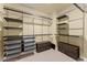 Spacious walk-in closet featuring custom shelving and drawers at 1211 Comet View Se Trl, Smyrna, GA 30082