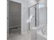 Contemporary bathroom with glass-enclosed shower, soaking tub, and walk-in closet at 517 Elkwood Ln, Mcdonough, GA 30253