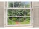 Window with a view of the green trees and landscaped walking paths at 3200 Wood Valley Nw Rd, Atlanta, GA 30327