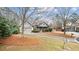 Front exterior showcasing the home's curb appeal and landscaping at 1315 Thunder Gulch Pass, Suwanee, GA 30024