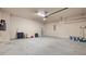 Spacious garage with ample space and an automatic door opener at 1315 Thunder Gulch Pass, Suwanee, GA 30024