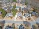 Aerial view of the property showcasing its location within a quiet, residential neighborhood at 1574 Stepstone Way, Lawrenceville, GA 30043