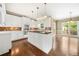 Bright, modern kitchen with a central island, perfect for entertaining, and stainless steel appliances at 1574 Stepstone Way, Lawrenceville, GA 30043