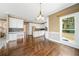 Stylish kitchen showcasing white cabinetry, modern appliances, and a functional layout for cooking and gathering at 1574 Stepstone Way, Lawrenceville, GA 30043