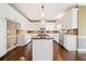 Well-equipped kitchen featuring an island, updated appliances, and plenty of counter space at 1574 Stepstone Way, Lawrenceville, GA 30043