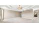 Spacious main bedroom with tray ceiling and ample natural light at 1574 Stepstone Way, Lawrenceville, GA 30043