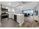 Modern kitchen featuring stainless steel appliances, white countertops, and an open layout with views of the living area at 620 Peachtree Ne St # 503, Atlanta, GA 30308