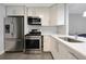Well-equipped kitchen boasting stainless steel appliances, a gas range, and a stylish countertop for meal preparation at 620 Peachtree Ne St # 503, Atlanta, GA 30308