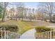 Expansive backyard view with mature trees and well-manicured lawns at 2330 Bonnybrook Way, East Point, GA 30344