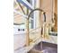 Kitchen sink with modern gold faucet and marble countertops by window at 642 Austin Se Dr, Smyrna, GA 30082