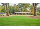 Beautiful home with a well-manicured lawn and mature trees, offering a serene and inviting atmosphere at 642 Austin Se Dr, Smyrna, GA 30082